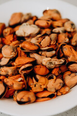 Delicious shrimp and mussels. Seafood on a white plate