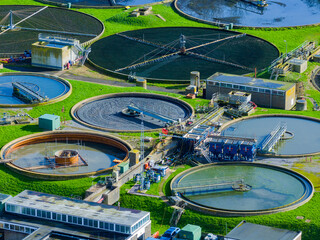 Medium telephoto aerial shot of sewerage treatment plant near Salisbury, UK