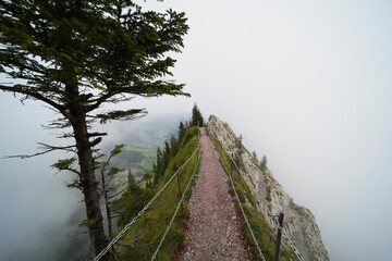 Hiking trail on the ,,Grosser Mythen" a beautiful mountain 1,898 m high in the canton of Schwyz in Switzerland. 
