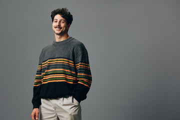 Man copyspace fashion portrait trendy smile face handsome standing joyful positive hipster sweater...