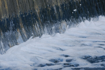 water flowing into the pond