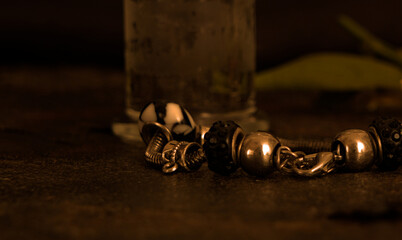 Fine art still life from Italy: fruits, seeds or bracelets