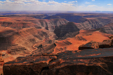 The harsh canyon landscape of the Goosenecks of the San Juan river from Muley Point viewpoint, Utah, Southwest USA.