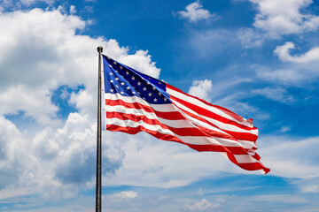 USA flag waving against sky