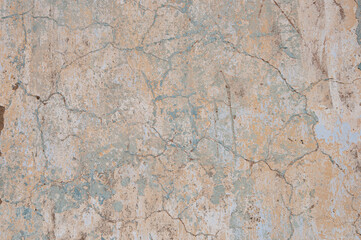 Old weathered cracked plaster wall