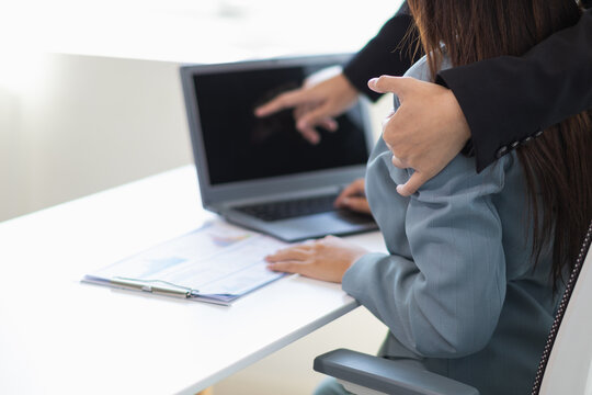 manager is harassing his secretary in office after calling his secretary to discuss work which is considered a threatening act Sexuality in workplace. concept Anti harassmentSexuality in workplace
