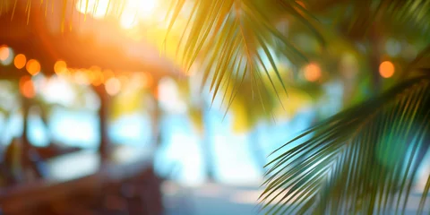 Fototapeten  Tropical summer vacation blurred banner background with pool and palm leaves © KEA