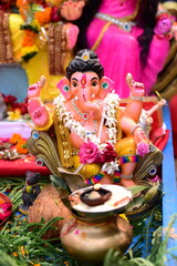 Lord Ganesha, Ganesha sitting, lord ganesha sculpture over black background. celebrate lord ganesha festival, Indian ganesh Chaturthi festival