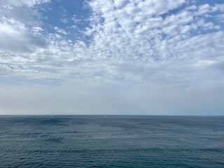 Cloudy ocean horizon, seascape background