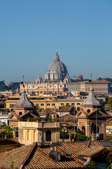 Fototapeta na wymiar Aerial view of the city with Saint Peter's Basilica in Vatican City in the distance, Rome, Italy