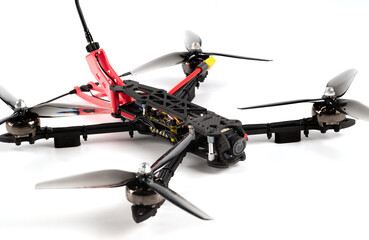 Photo of a do it yourself quadcopter fpv on a white background. Modern Combat FPV drone on the...