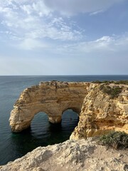 Fototapeta premium Rocky coastline, ocean horizon, rocks at the ocean, cliffs