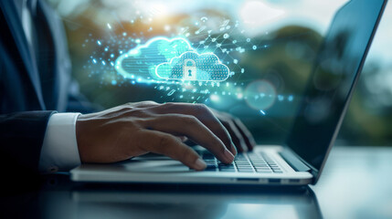 person's hands typing on a laptop with a digital overlay of a secure cloud network graphic, implying a focus on cybersecurity or data protection.