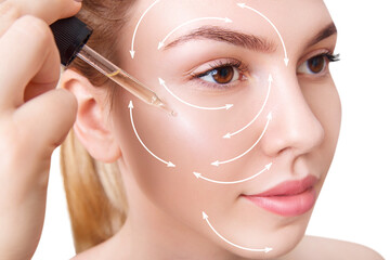 Woman applying cosmetics remedy on beautiful face.