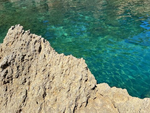 Rocky coast of turquoise blue sea