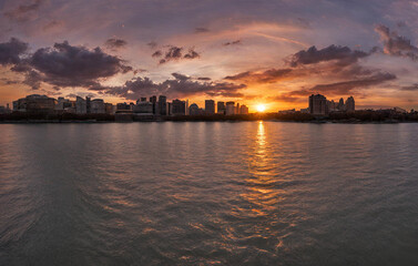 Fototapeta premium Evening sky click in river and city, A beautiful sunset 