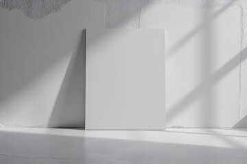 Fototapeta premium mockup of a blank white sign with a white plaster wall background