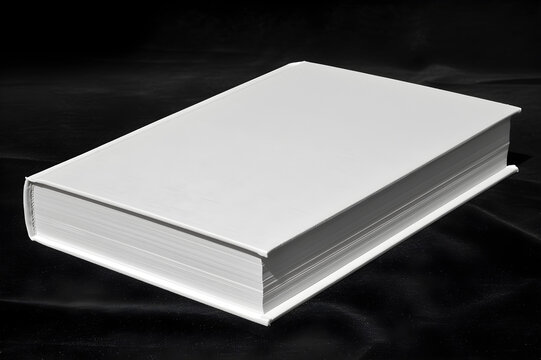 mockup of a blank cover white book isolated on a black background