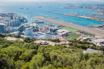 Greenery on hill with Princess Anne's and Princess Amelia’s Batteries at The Rock, cityscape and...