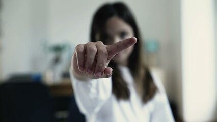 Little Girl's Hand Shaking Finger in Negation, Waving NO in Refusal