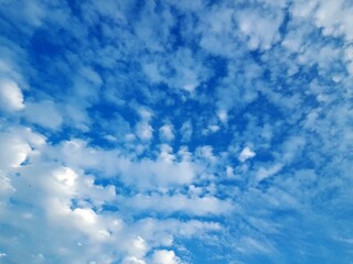 BLUE SKY WITH CLOUDS FOR THE BACKGROUND