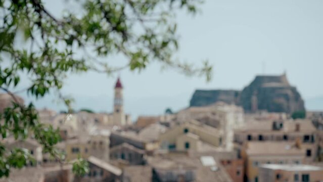 Panoramic view of Corfu city and the bell tower of the Saint Spyridon Church and old fortress seen from the new Fortress