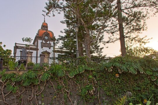 A low angle view of Heredad de Arucas y Firgas building in Municipal park of Arucas, Gran Canaria, Spain