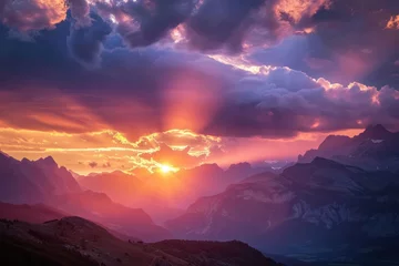 Fototapete Aubergine Vibrant sunset over mountainous landscape