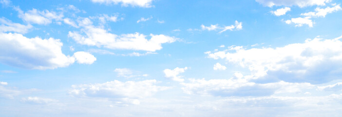 Blue sky with white clouds. Panoramic view.