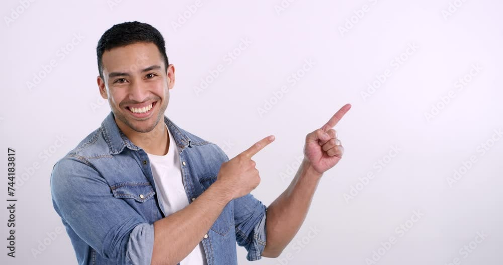 Poster man, face and pointing to promotion with thumbs up for choice and review announcement in studio. moc