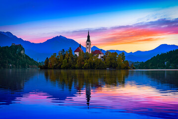 Bled, Slovenia. Morning view of Bled Lake, island and church with Julian Alps in background - 744195680
