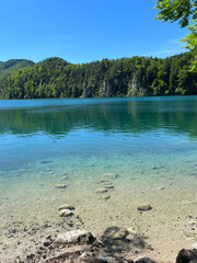 Germany, Füssen - 2022, May: Alpsee lake in Füssen 