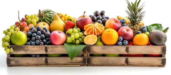 A wooden crate filled with a variety of fresh exotic fruits, neatly arranged on a white background.
