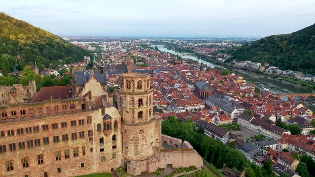 Heidelberg castle germany city fly over old town and river in front heidelberg bridge and castle aerial in 4K.