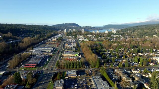 Barnet Highway At The Border Of Coquitlam And Port Moody In British Columbia, Canada. Burrard Inlet In Distance. aerial shot