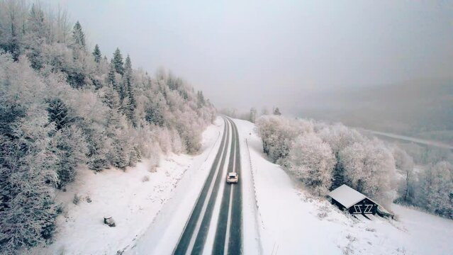 Volvo V40 car driving in a cold landscape