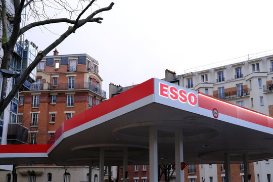 The facade of an Esso station. Paris, France - February 23, 2024.