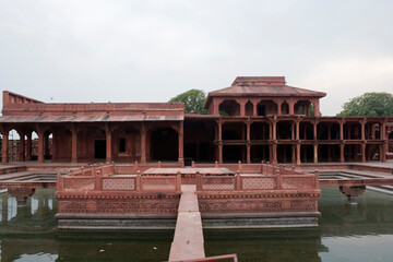 Agra, Uttar Pradesh / India - February 7, 2012 : The Anup Talao and the Khwabgah (house of dreams) Akbar's residence in the courtyard of the Jodhabai's palace in Fatehpur Sikri, Agra. © Shyamal