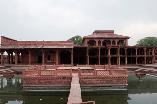 Agra, Uttar Pradesh / India - February 7, 2012 : The Anup Talao and the Khwabgah (house of dreams) Akbar's residence in the courtyard of the Jodhabai's palace in Fatehpur Sikri, Agra.