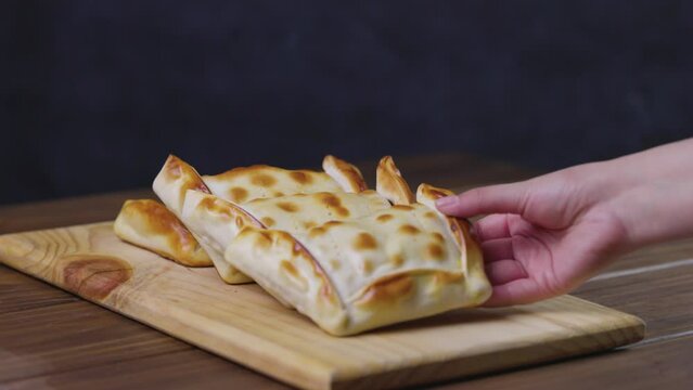 Chilean empanadas variety. Chile Food background. Fresh ingredients on wood. Selective Focus. Fiestas Patrias Chile.