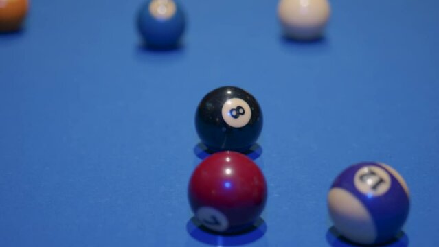 Cue ball opens snooker game and bounces on the table after hitting the triangle of balls