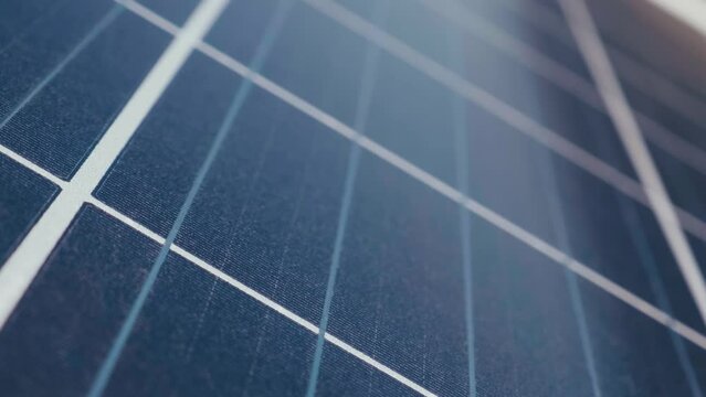 Photovoltaics solar panels in a solar park close up. Solar panels on sunny day. Solar panels system power generators. Alternative power energy concept.