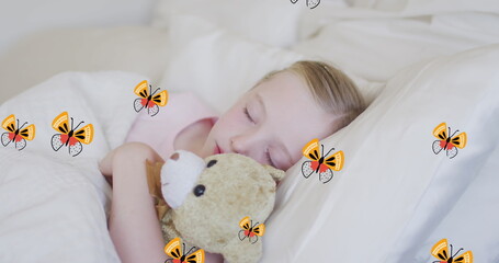 Image of butterflies over sleeping caucasian girl