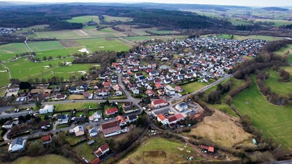 Aerial view of the city Löschenrod in Germany on a sunny day in Autumn