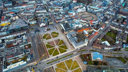 Aerial around the downtown of the city Kassel in Hessen, Germany on a cloudy day in early spring.	
