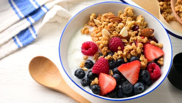 homemade granola with berries and yogurt