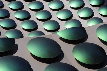 Abstract pattern formed by green polka dots, in the decoration of a building in the area of The Strip in Las Vegas