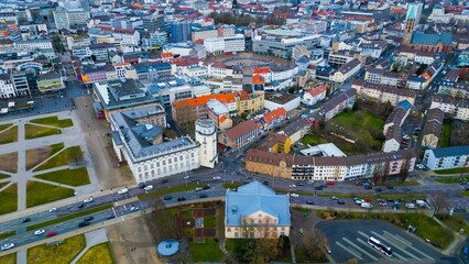 Aerial around the downtown of the city Kassel in Hessen, Germany on a cloudy day in early spring	