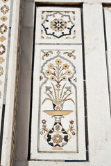 AGRA, UTTAR PRADESH / INDIA - FEBRUARY 27, 2012 : INLAID WORK OF MARBLE STONE ART ON WALL OF ITMAD UD DAUILA (BABY TAJ).