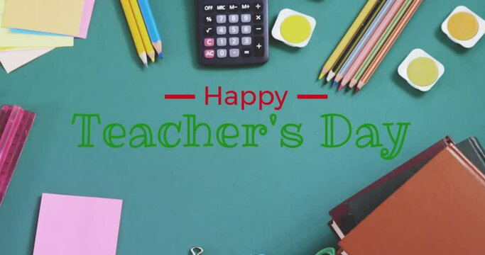 Animation of happy teachers day text banner against school equipment on green surface